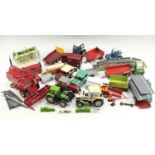 A large group of Britains Ltd diecast farm vehicles, buildings and accessories, including Farm