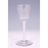 A mid-18th Century opaque twist stem wine glass, having a round funnel bowl wheel cut in depiction
