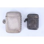 A Victorian silver watch chain fob vesta case, of diagonally reeded cushion form, Rolason