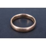 A 9ct gold D-section wedding band, London, 1952, 7.15 g, size X, 5 mm wide
