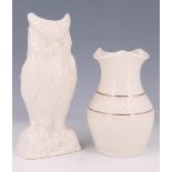 Two modern Belleek vases, respectively modelled as an owl and baluster shaped, owl 21 cm high