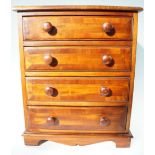 A miniature early 19th Century style mahogany cross-banded chest of drawers, 43 cm x 29 cm x 53 cm