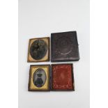 Three Victorian tintypes, two in embossed leather cases, one in gilt metal frame, (two a/f), largest