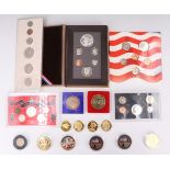 A 1983 US proof coin pack together with two others similar, two Canadian coin packs and a quantity