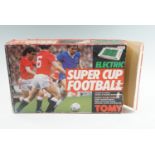 A boxed Tomy electronic "Super Cup Football" game, 34 cm