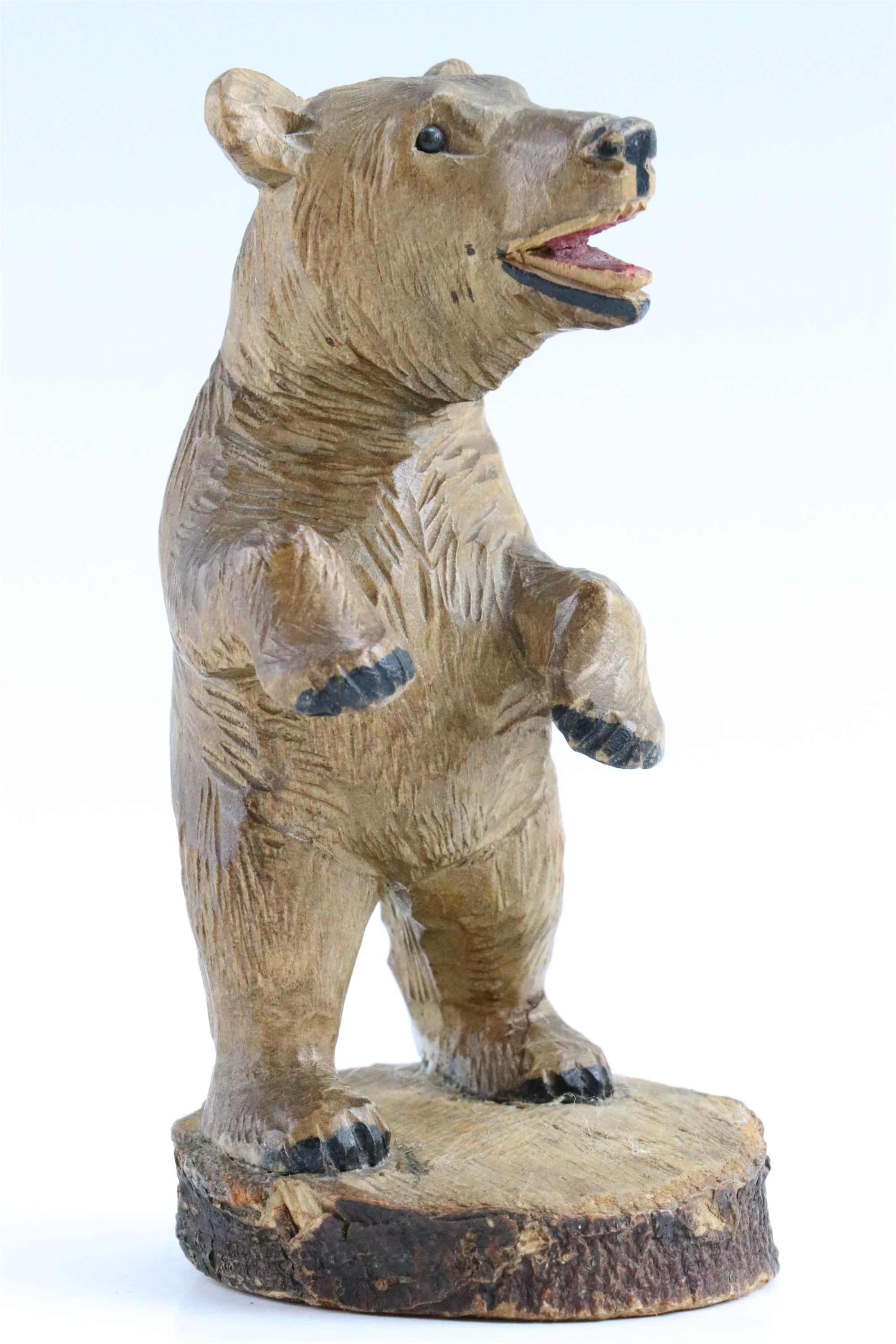 A mid 20th Century Swiss treen carved wooden bear, marked "Berne. SW, 1953" to base, 12 cm