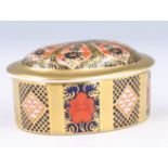 A modern Royal Crown Derby Old Imari pattern ( 1128 ) lidded oval ring box, 8 x 6 x 4 cm
