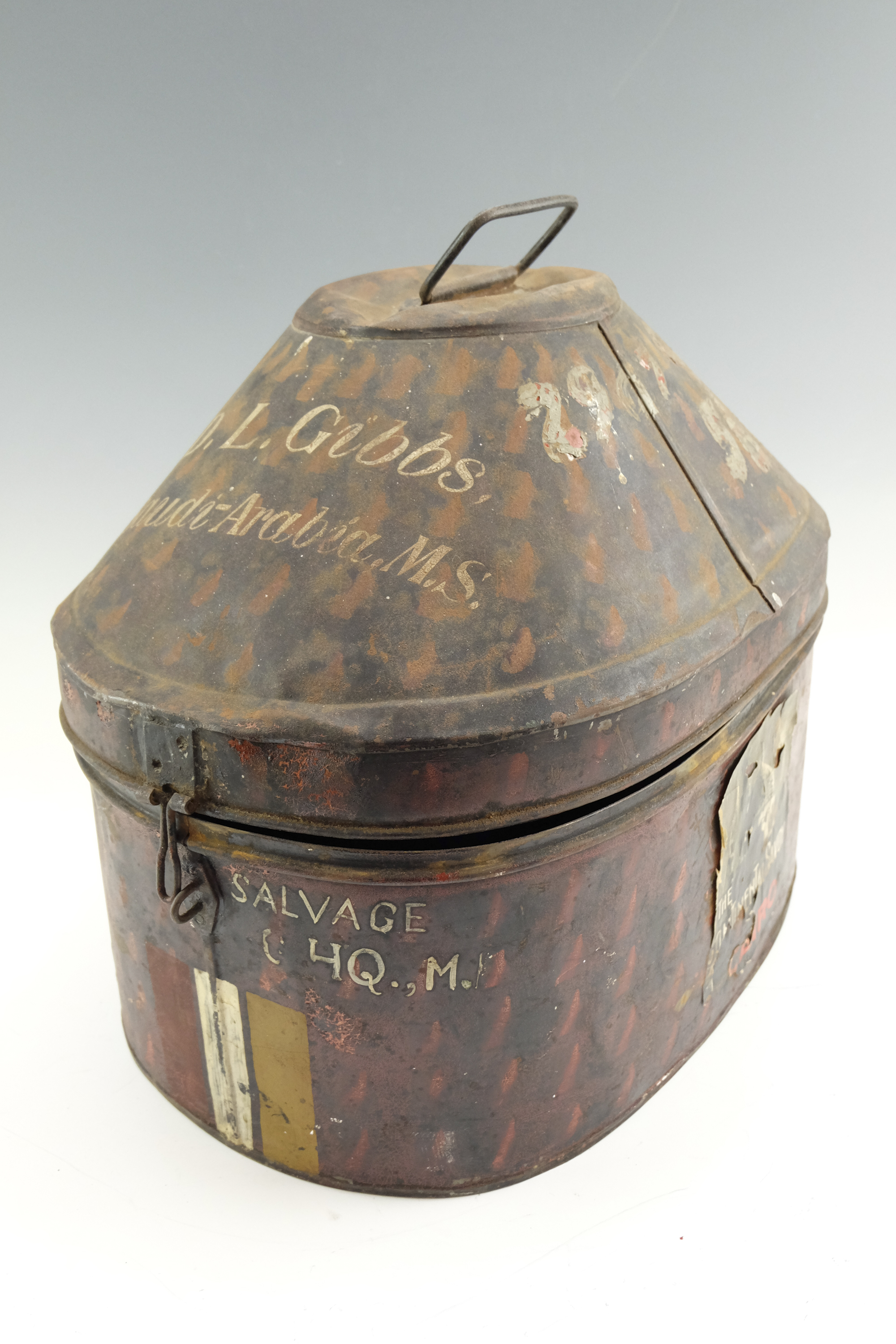 An inter-War British Army officer's Wolseley Pattern tropical helmet tin bearing the name of Captain