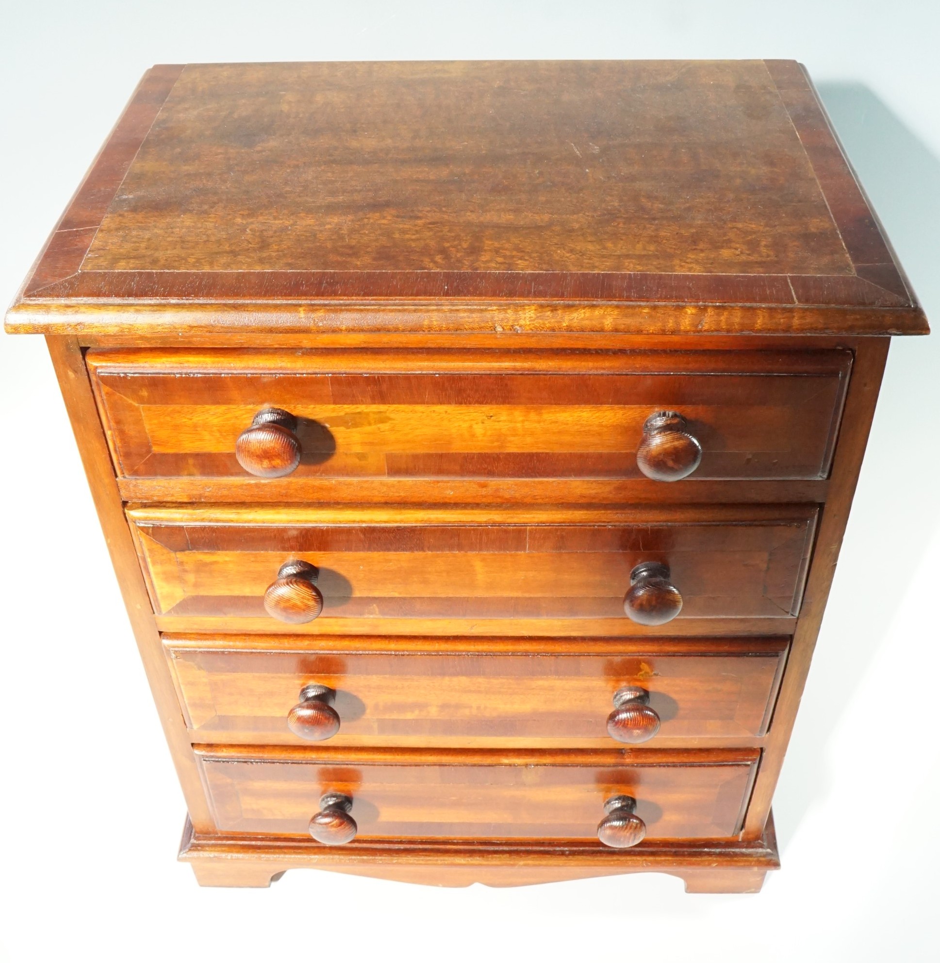 A miniature early 19th Century style mahogany cross-banded chest of drawers, 43 cm x 29 cm x 53 cm - Image 2 of 5