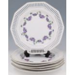 A set of six late 19th / early 20th Century dessert plates, decorated with clematis and having