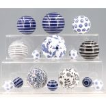 15 modern reproduction Scottish ceramic carpet bowls of varying sizes