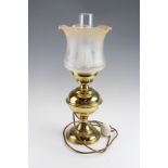 A brass oil lamp form electric table lamp, 50 cm