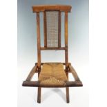 A Victorian beech and string seated folding garden chair, 77.5 cm standing