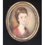 A portrait miniature of a young Georgian woman with quaffed hair and red dress, watercolour on