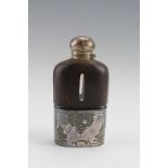 An Edwardian electroplate-mounted glass and silver plate hip flask, the leather covered flask having