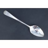 A George III silver Old English pattern desert spoon, having an engraved monogram, possibly John