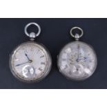 Two Victorian silver pocket watches, each having a lever movement and fancy engraved silver face