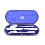 A Victorian cased silver Christening set, each element having a decorative beaded-collared stem /