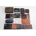 A group of vintage gentlemen's accessories including three pairs of pince-nez, a cut-throat razor,