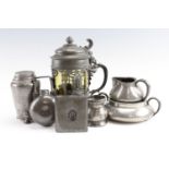 A Tudric Pewter sugar basin and milk jug, 1930s sugar caster, pewter and glass stein having high