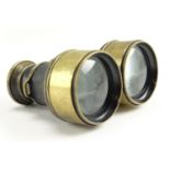 A pair of late 19th / early 20th Century binocular field glasses, 10 cm tall