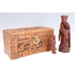 Two Chinese wooden figures, 21 cm tallest, together with a miniature Chinese chest, 26 cm x 13 cm