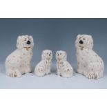 Two sets of Royal Doulton / Beswick Staffordshire dogs, 13 cm tallest