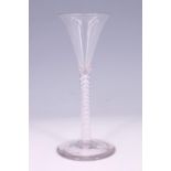 A mid-18th Century style opaque twist stem wine glass, having a conical bowl with everted rim, 15.