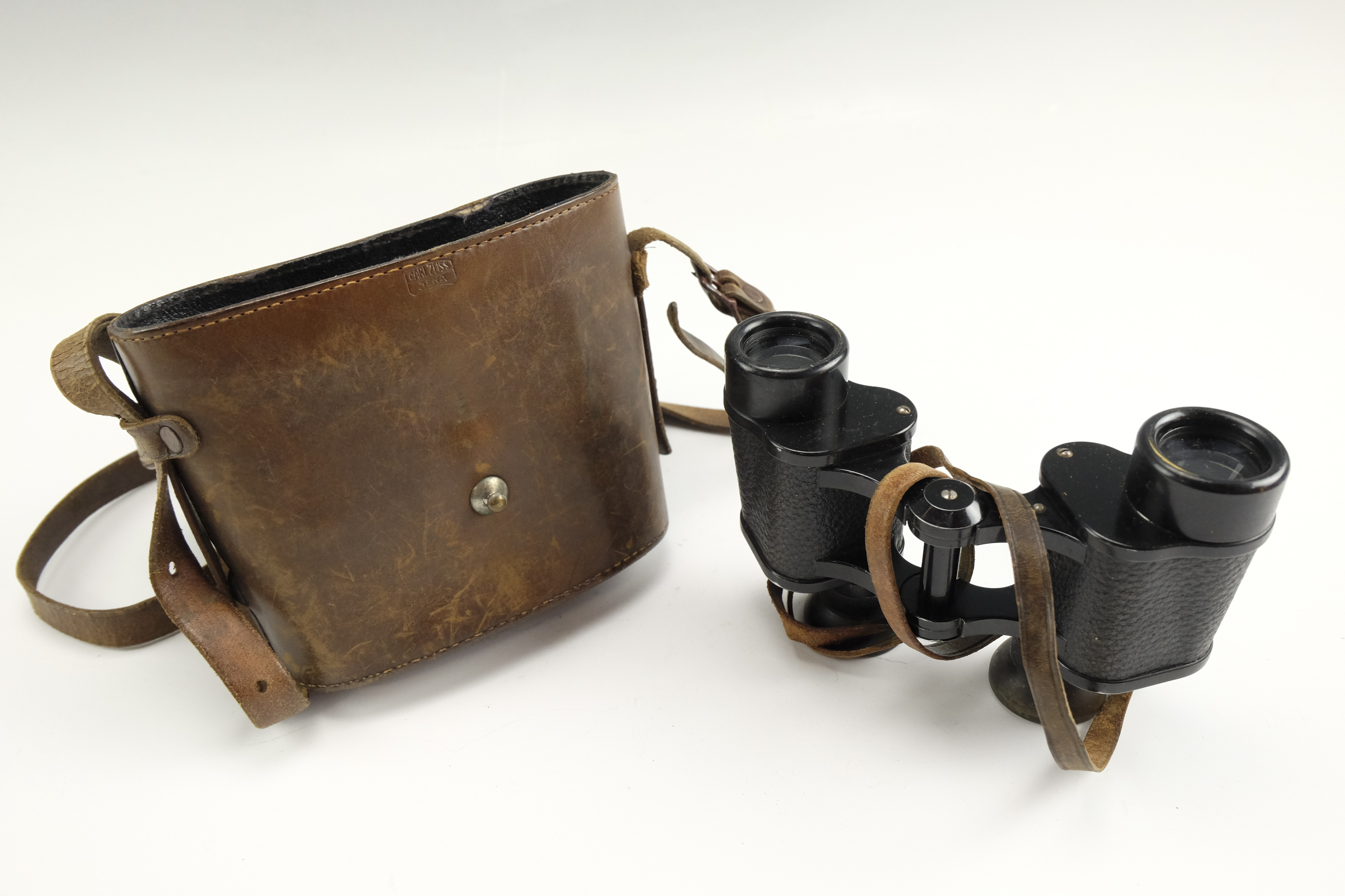 A pair of Carl Zeiss Jena 8x24 binoculars, in leather case