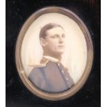 A hand tinted photographic portrait of a Naval Officer in full dress, late 19th / early 20th
