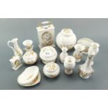 A quantity of Aynsley ware, including clocks, ginger jar, bud vase, etc, sixteen items
