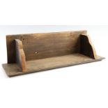 An oak bracket shelf, 54 cm x 16 cm x 16 cm