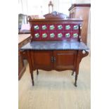 An early 20th Century walnut mirror back dressing chest, and conforming tile backed marble top