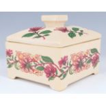 A modern ceramic lidded box by Arba designs for Harrods, hand decorated with honeysuckle, 13 x 13