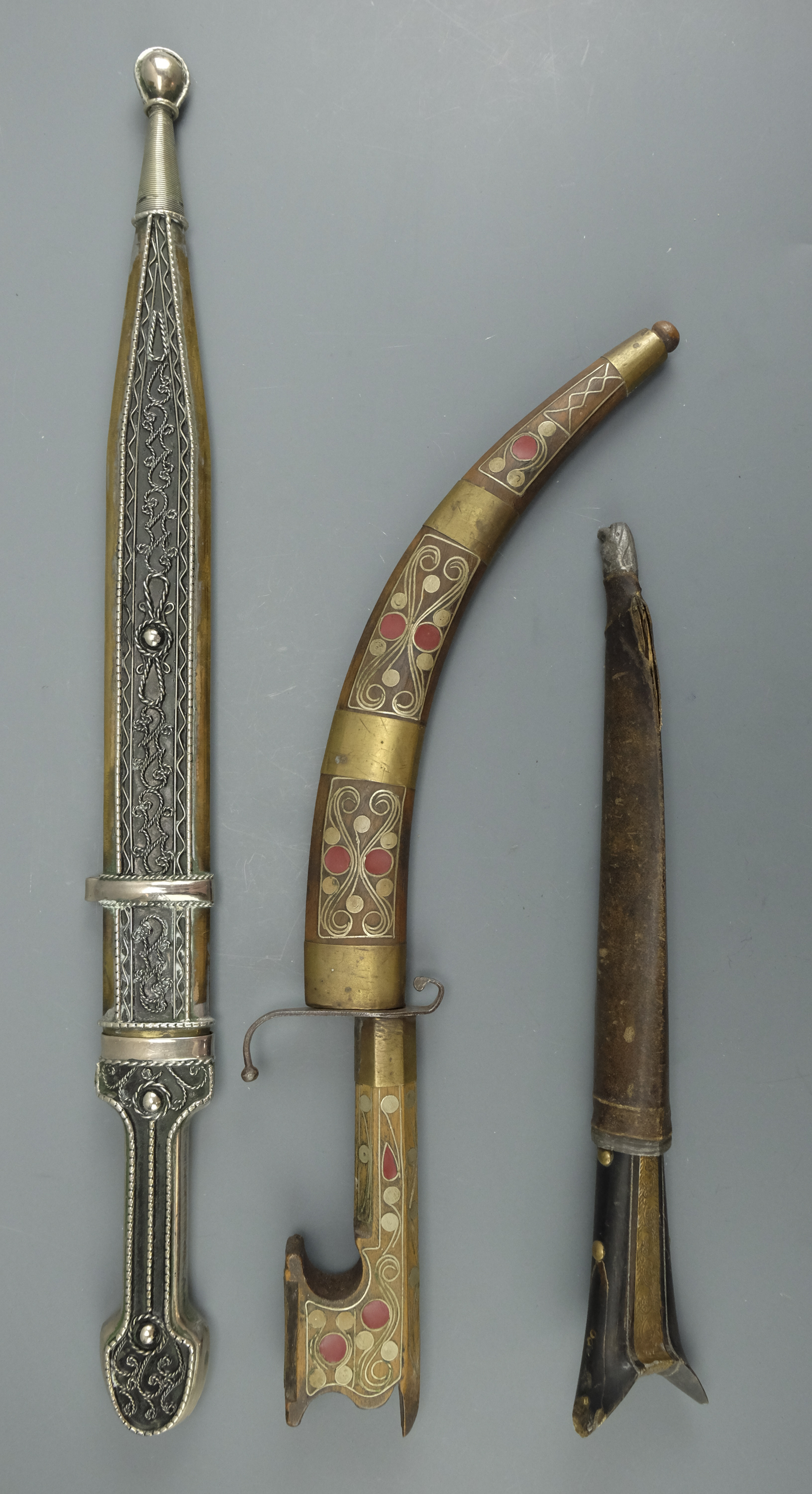 A North African flissa type knife, together with a kidjal and a pesh kabz dagger