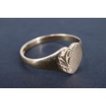 A modern heart shaped 9 ct gold signet ring, having wriggle-work engraved decoration, Birmingham,