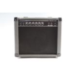 A Rocket 20B bass guitar amplifier, 38 x 18 x 33 cm