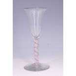 A mid-18th Century style polychrome twist stem wine glass, 15.5 cm