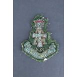 A Green Howards officer's bullion-embroidered cap badge