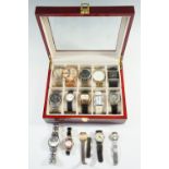 A quantity of fashion wristwatches, including an Emporio Armani stainless steel example, a large