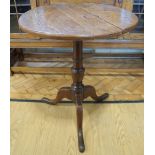 A George III oak tripod table, 57 x 71 cm