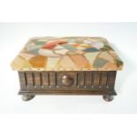An upholstered stained oak box stool, 40 cm x 30 cm x 20 cm