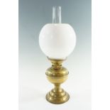 An Eltex brass oil lamp, having a duplex gallery burner, 50 cm