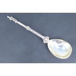 A late 19th Century parcel-gilt-silver spoon in the manner of the Renaissance, having a fig shaped