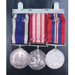 A Defence medal, Naval General Service Medal with Malaya Clasp and Royal Navy Long Service and