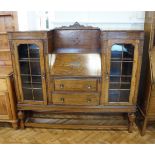 A George V oak bureau cabinet, 148 x 36 x 137 cm