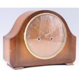 A 1950s mahogany mantle clock, having a Smiths movement striking on a gong, 29 x 12.5 x 23 cm, [