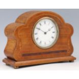 An Edwardian inlaid mahogany mantle clock, having a drum movement and platform escapement, 21 x 17 x