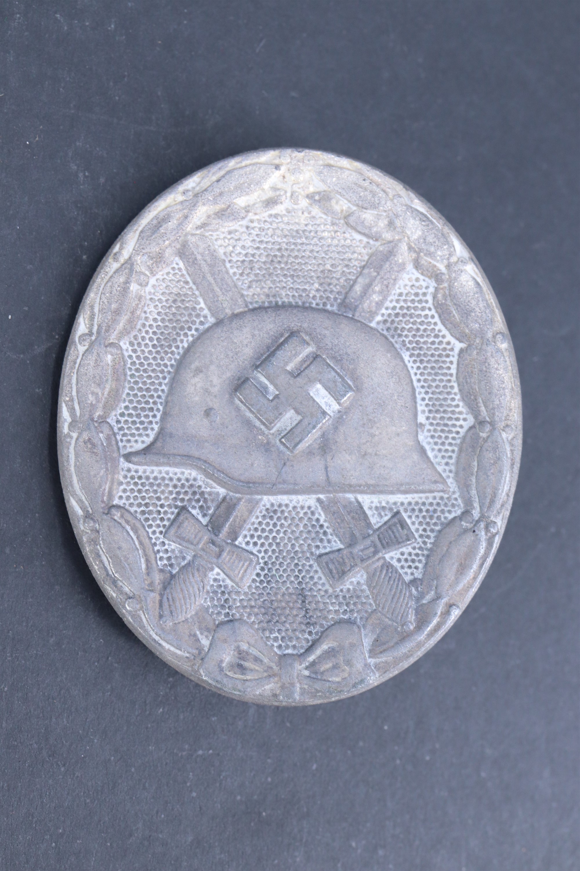 A German Third Reich silver wound badge marked 107, (Carl Wild, Hamburg)