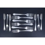 A set of George III silver Hanoverian pattern dinner and desert forks for six settings, all